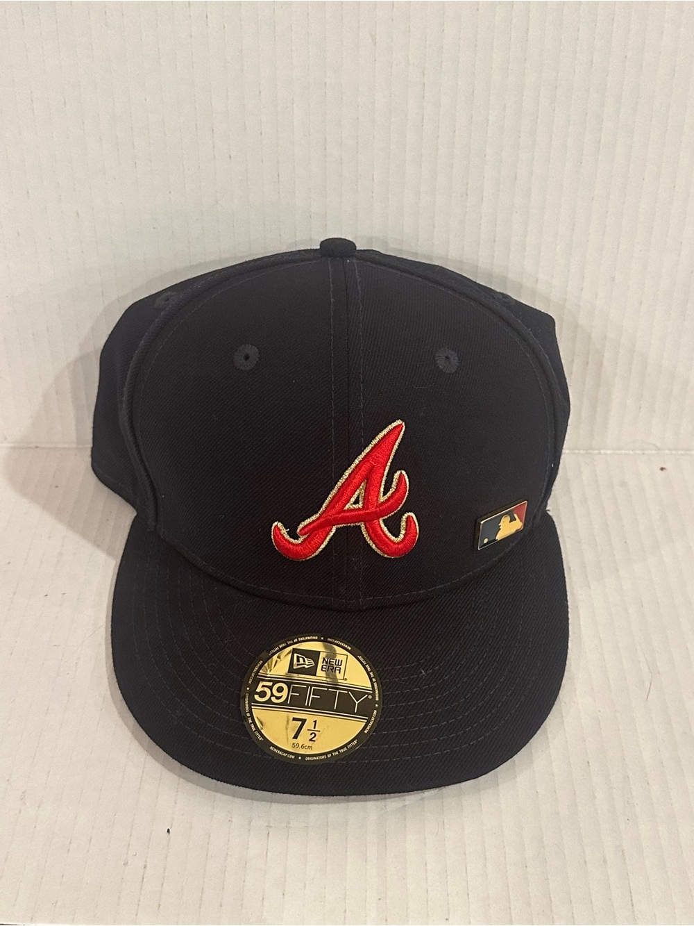 New Era Black Hat with Red Atlanta 'A' and Gold Accent